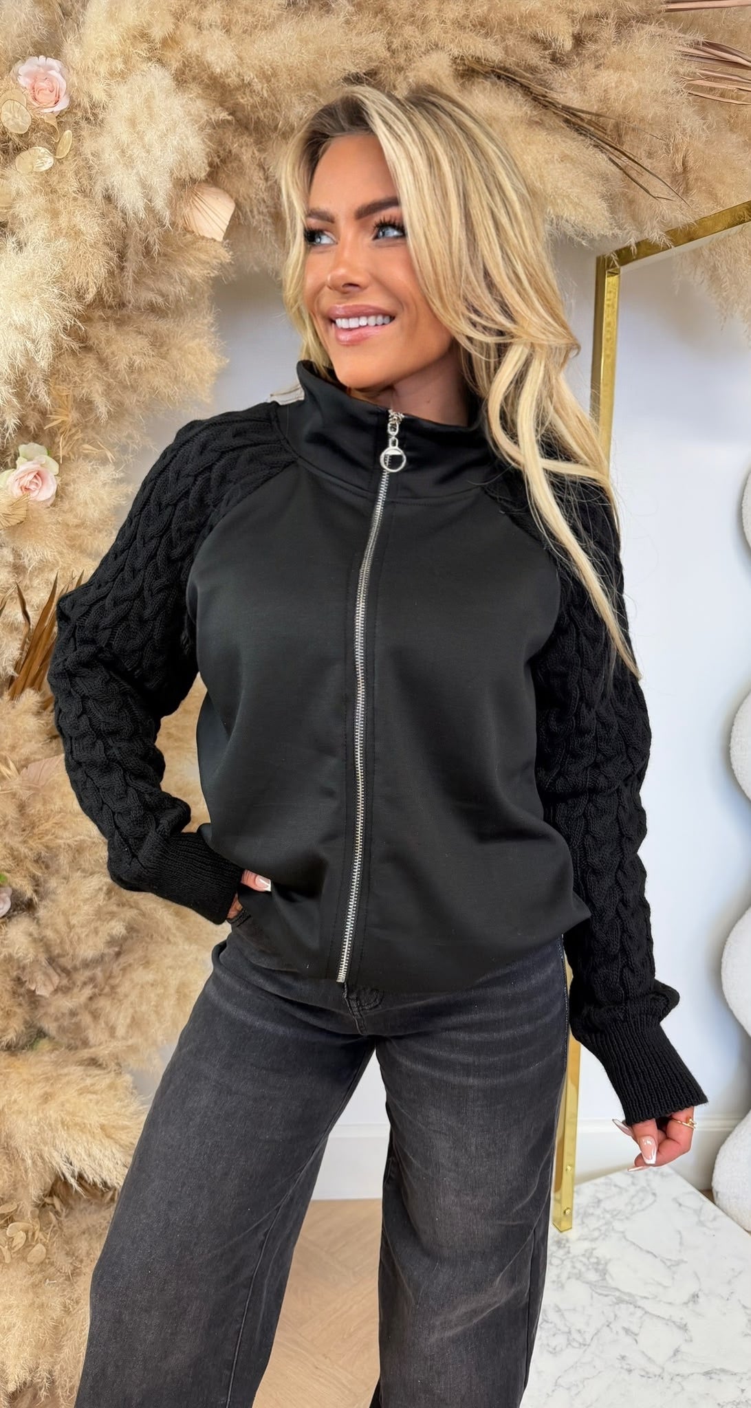 AMIKA KNITTED SLEEVE VEST BLACK